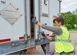 Premier yard worker following safety procedures
